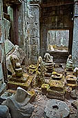 Ta Prohm temple - statues beheaded by the thieves